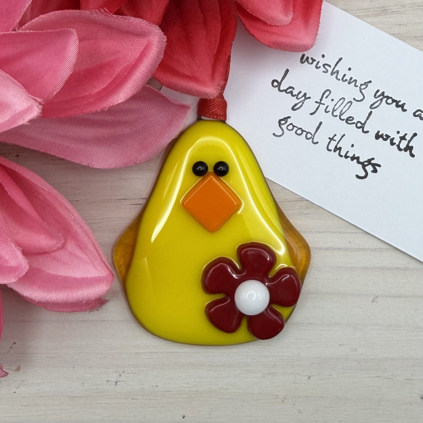 Fused Glass Baby Chick Ornament with a Red and White Flower
