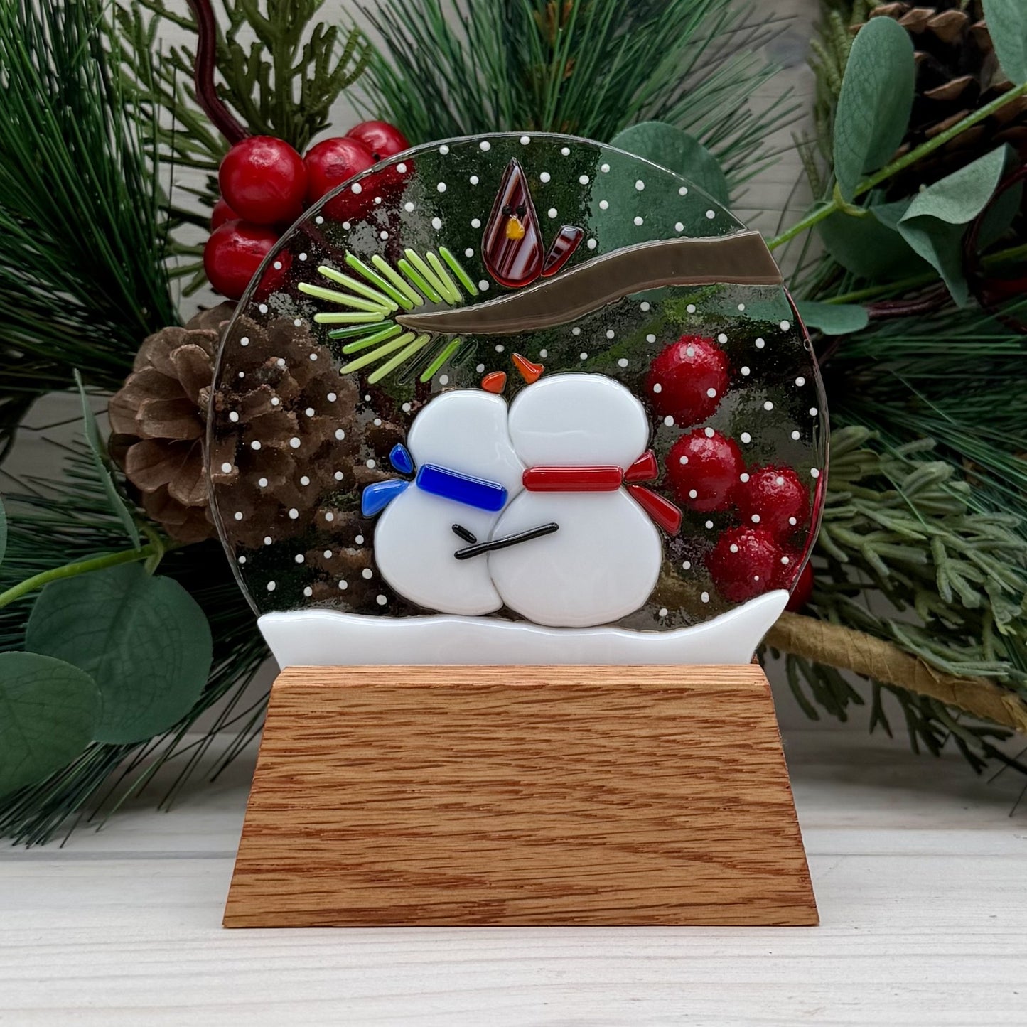 Fused Glass Snow Globe with Snowman Couple and Cardinal – Winter Glass Art with Oak Display Stand