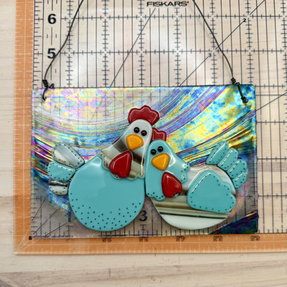 Whimsical Fused Glass Chicken Hanging Panel – Blue, Brown & Cream Chickens on Iridescent Glass