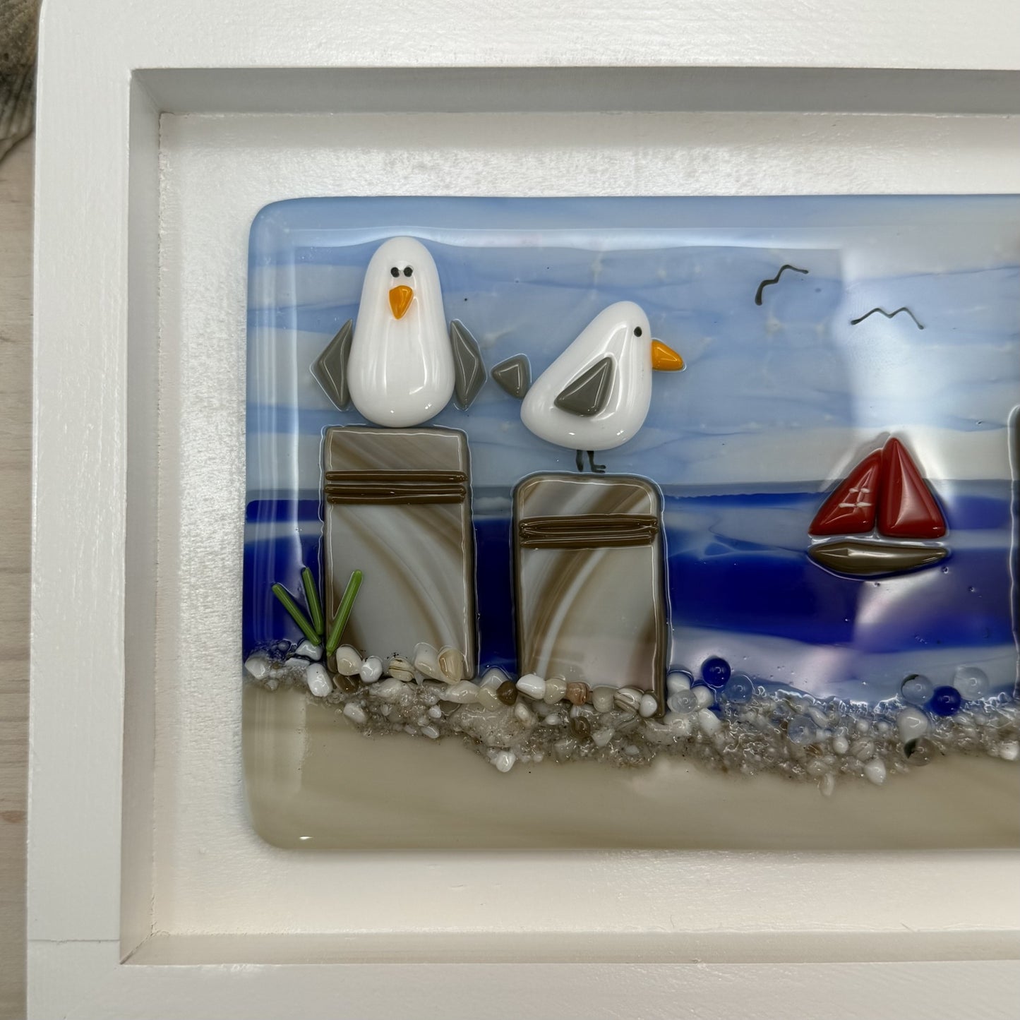 Playful Seagulls on Beach Pilings – Framed Fused Glass Coastal Art Panel