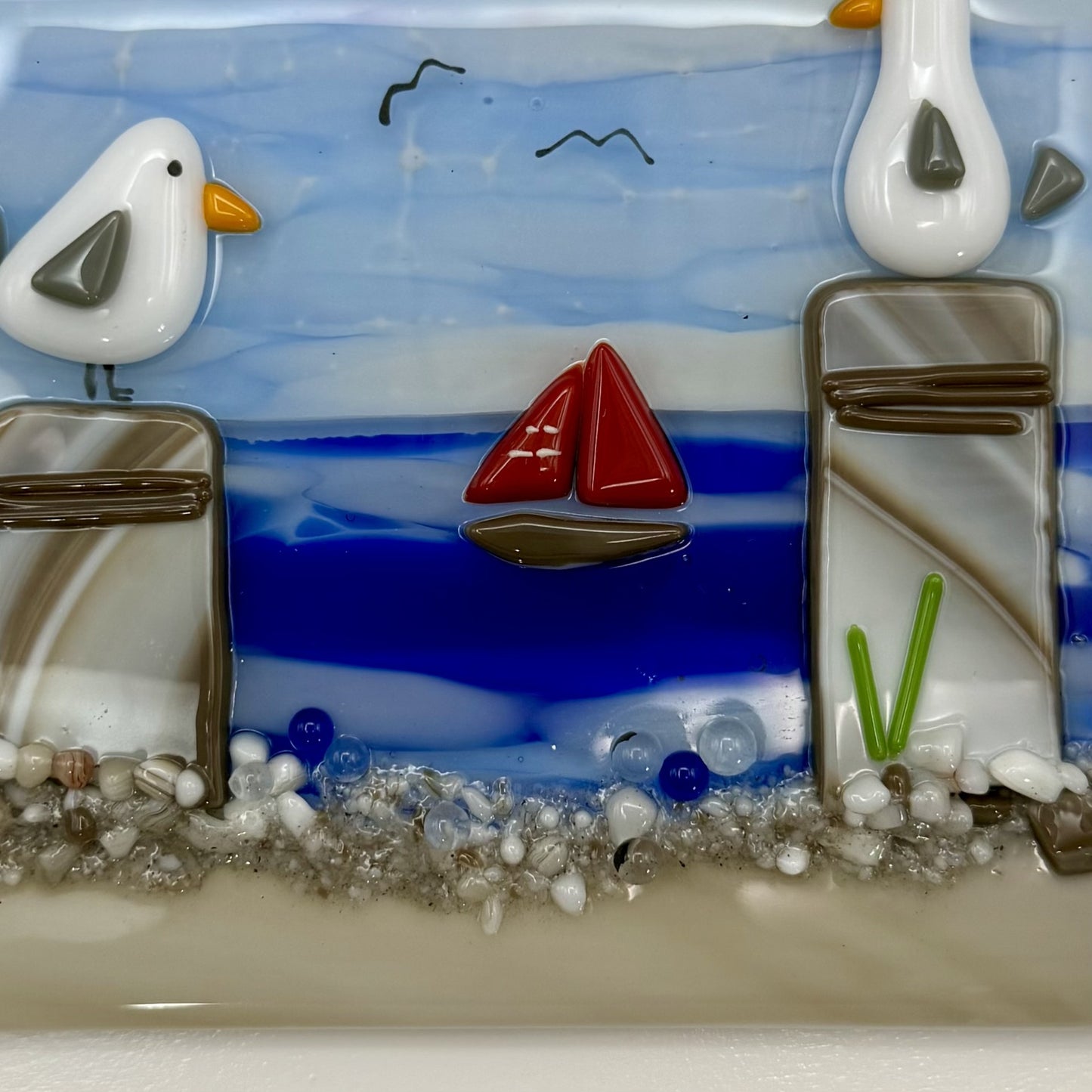 Playful Seagulls on Beach Pilings – Framed Fused Glass Coastal Art Panel