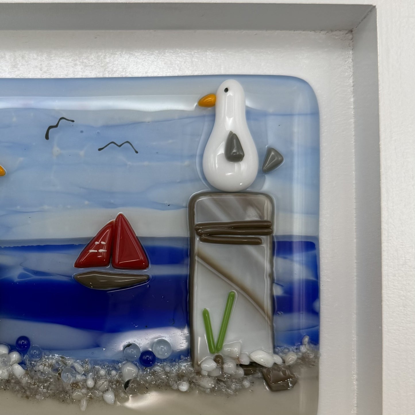 Playful Seagulls on Beach Pilings – Framed Fused Glass Coastal Art Panel