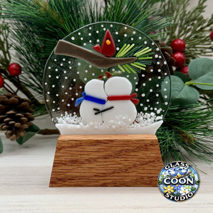 Fused Glass Snow Globe with Snowman Couple and Cardinal – Winter Glass Art with Oak Display Stand